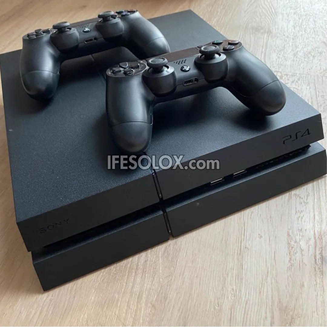 Sony Playstation 4 (PS4) 500GB Game Console with 2 DUALSHOCK 4 Controllers and 10 Games - Foreign Used