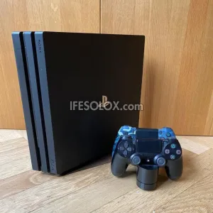 Sony Playstation 4 (PS4) Pro 1TB Game Console with 2 DUALSHOCK 4 Controllers and 10 Games - Foreign Used