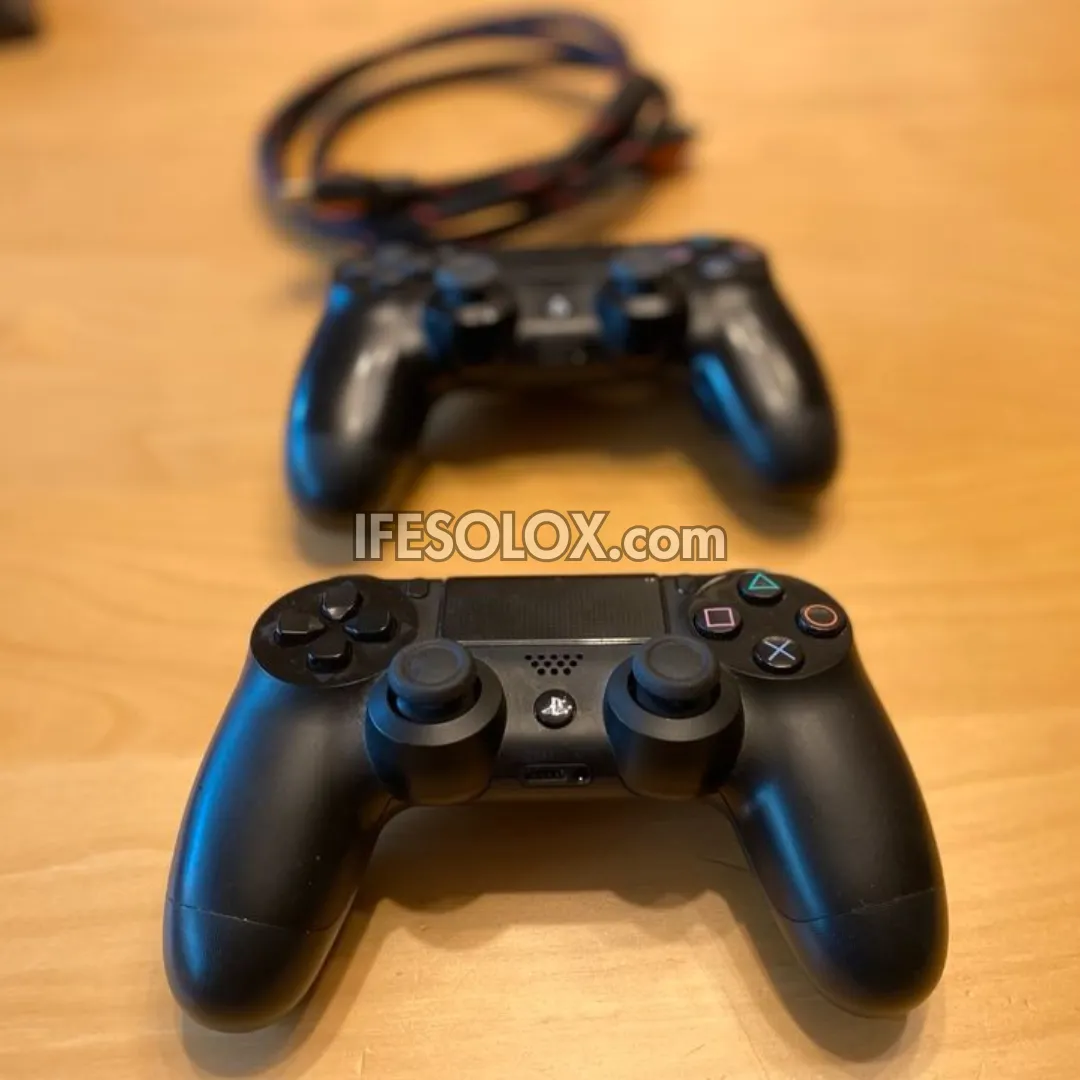 Sony Playstation 4 (PS4) Slim 1TB Game Console with 2 DUALSHOCK 4 Controllers and 10 Games - Foreign Used